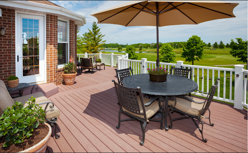 An image of a composite material deck with seating area. 