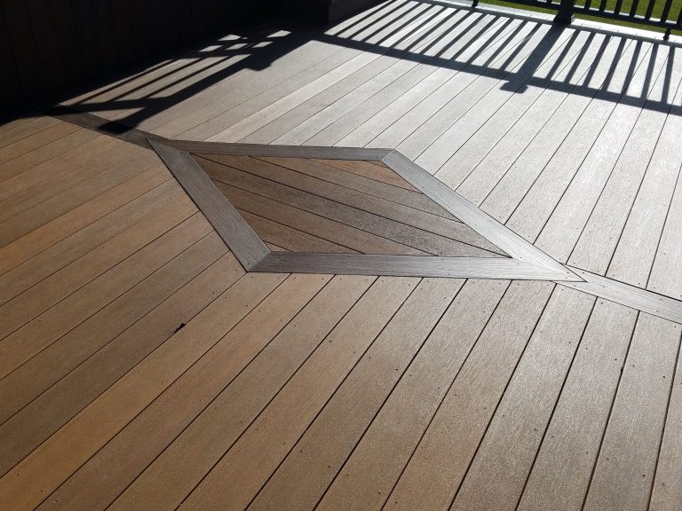 Composite deck with a diamond inlay pattern