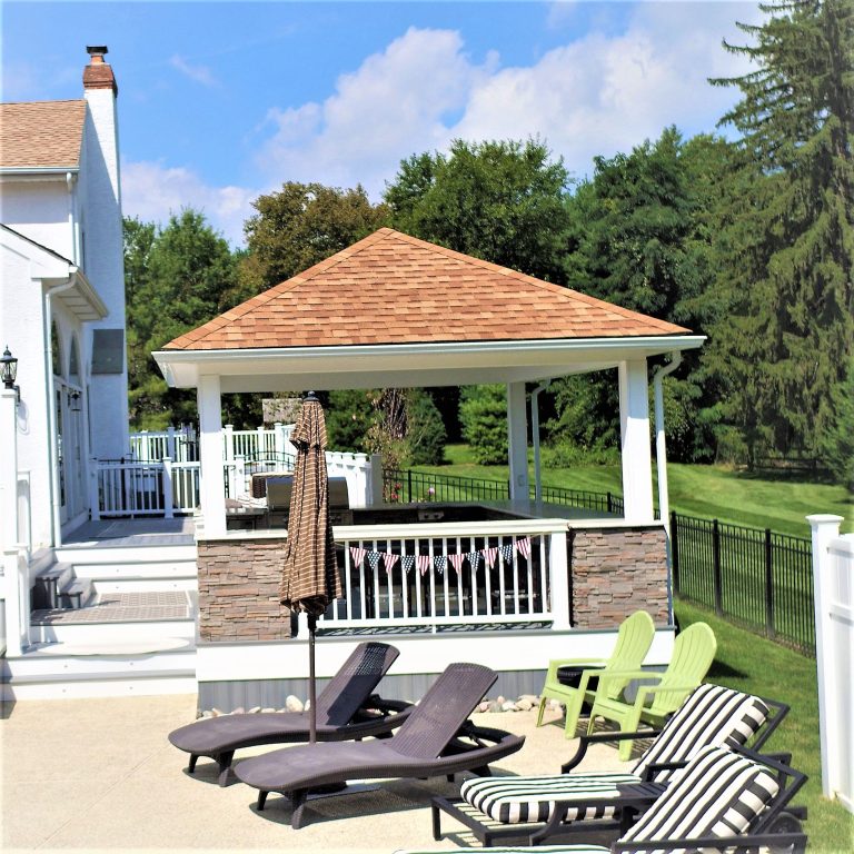 Gazebo on a deck overlooking a pool